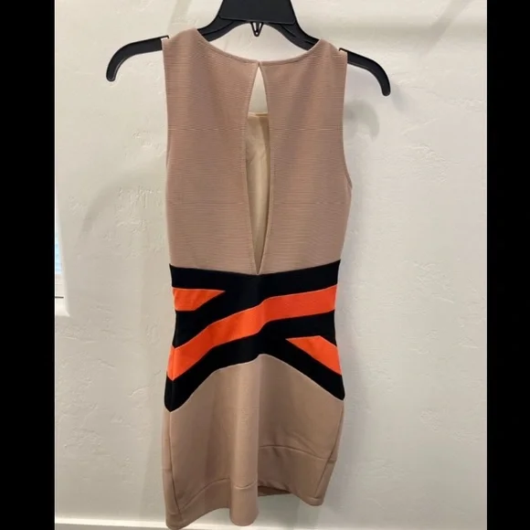 Tan bandage dress with bright orange and black waist detailing. - Picture 5 of 7